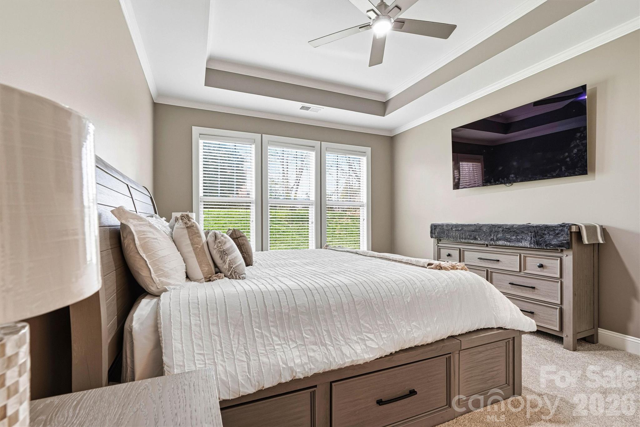 2830 Bellasera Way Matthews, NC 28105 - Photo 21 of 40 a bedroom with a bed and a television