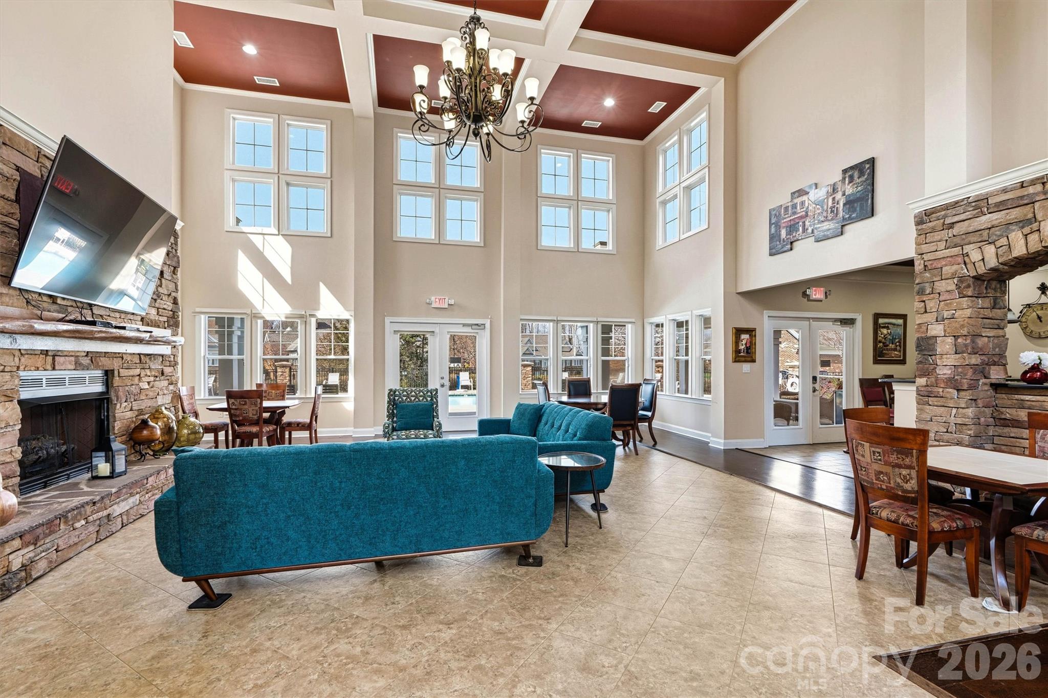 2830 Bellasera Way Matthews, NC 28105 - Photo 35 of 40 a living room with fireplace furniture and a flat screen tv