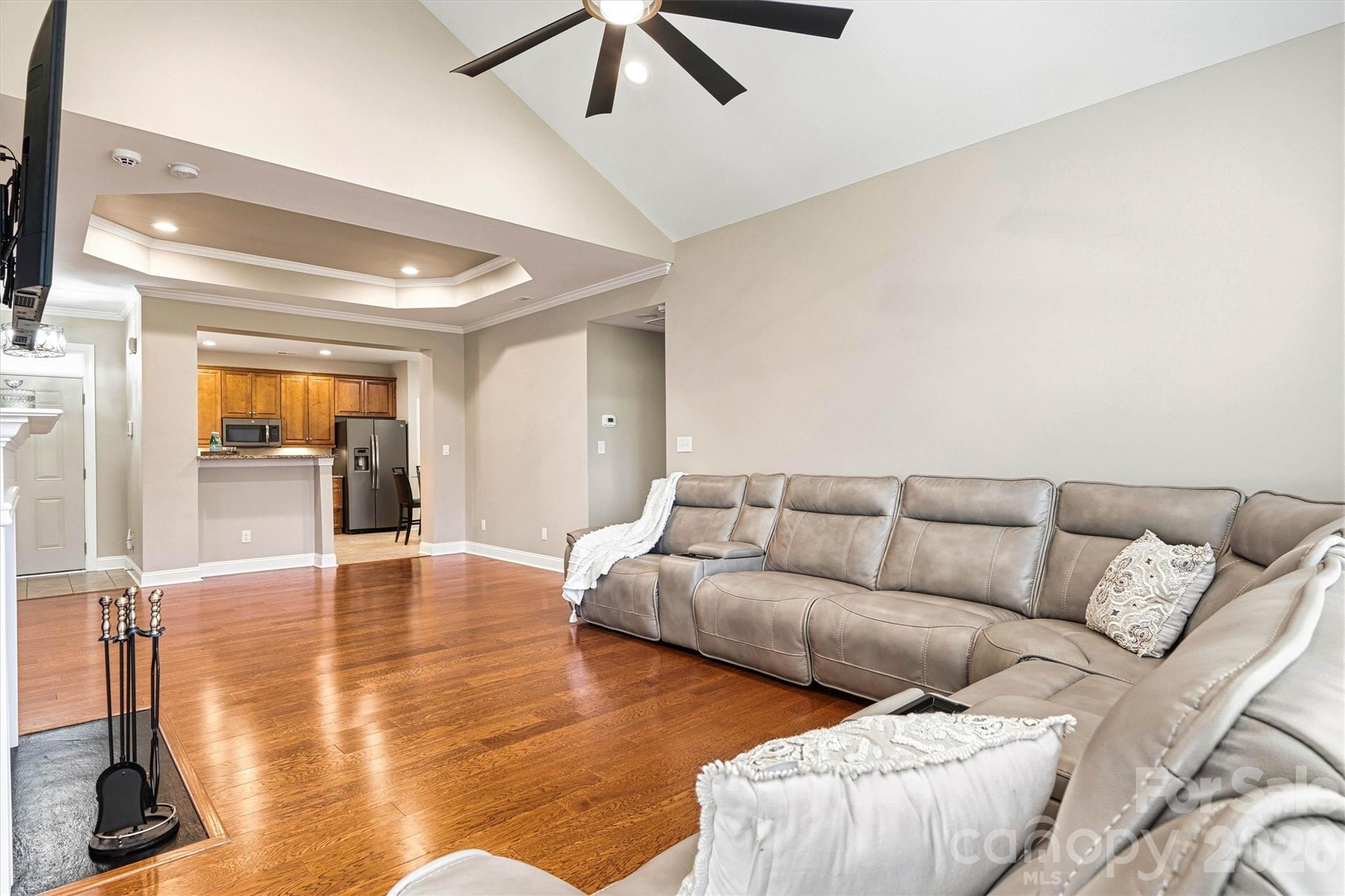2830 Bellasera Way Matthews, NC 28105 - Photo 7 of 40 a living room with furniture and a wooden floor
