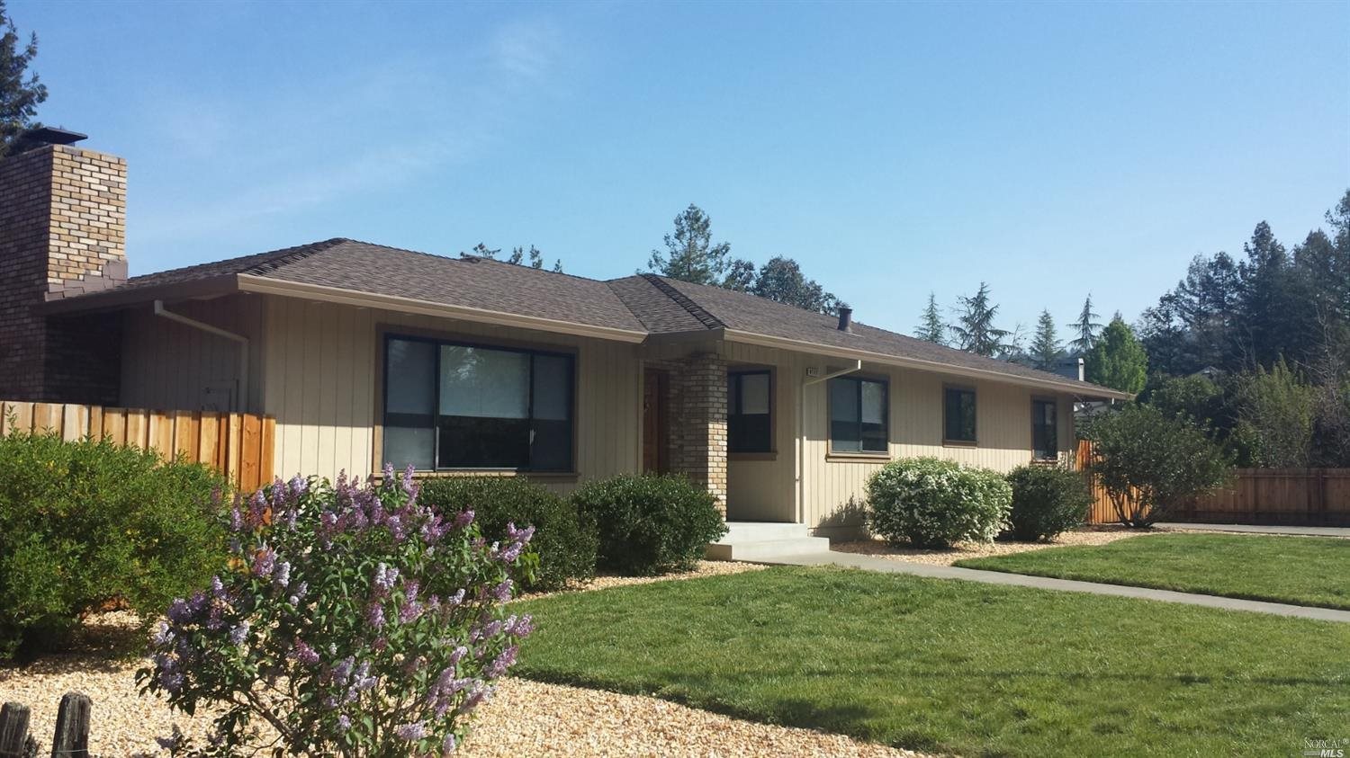 4717 Culebra Way Santa Rosa, CA 95409 - Photo 1 of 1 a front view of a house with a yard
