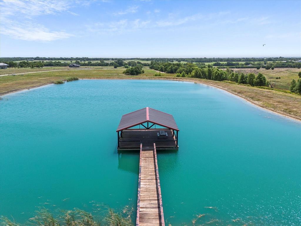 10641 County Road 632 Blue Ridge, TX 75424 - Photo 33 of 34 a view of a lake with a outdoor space