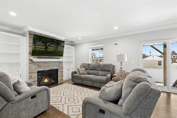 a bathroom with a sink a toilet and shower curtain