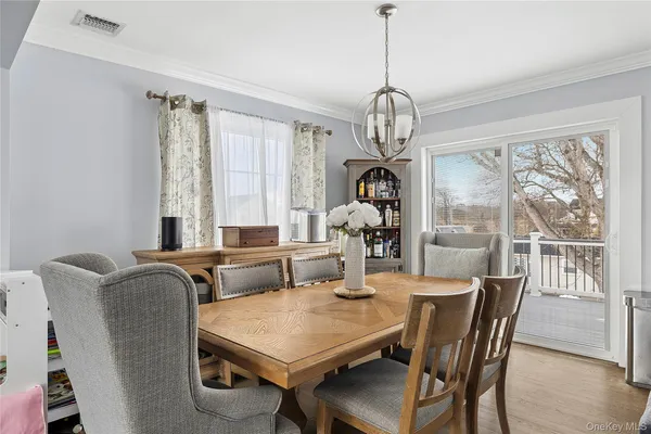 a living room with furniture and flat screen tv