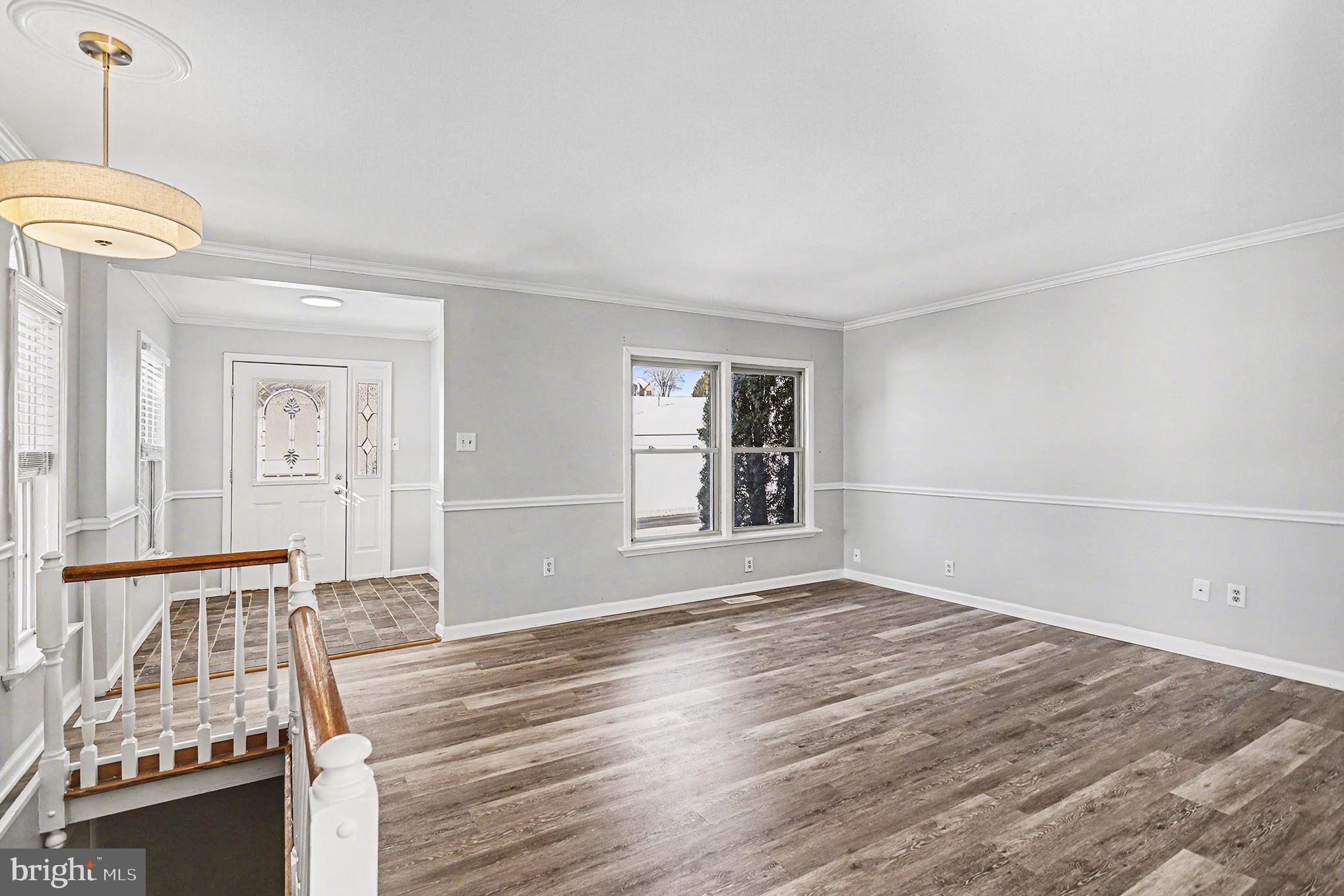 4570 Walters Hatchery Road Spring Grove, PA 17362 - Photo 6 of 38 Living room with modern lighting.