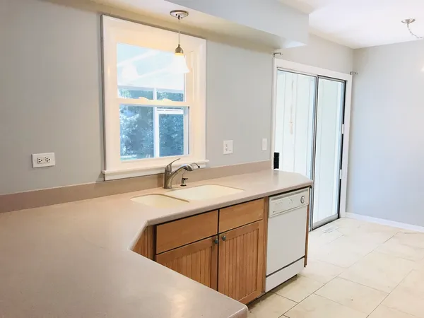 a bathroom with a sink and a large mirror