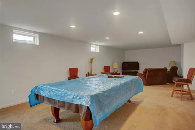 a bed room with furniture and a night stand