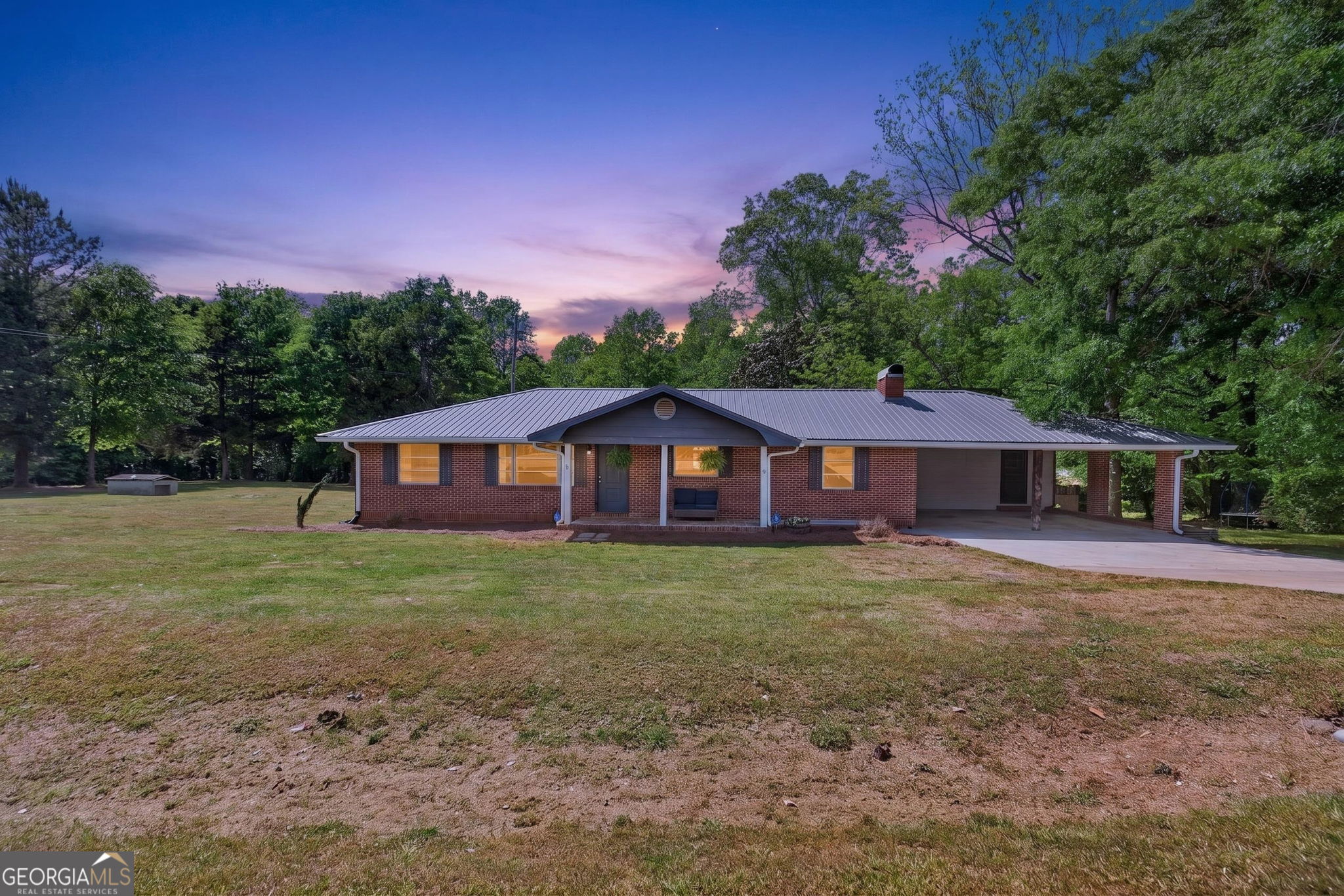 1861 Highway 100 Bowdon, GA 30108 - Photo 1 of 35 a view of a house with a big yard