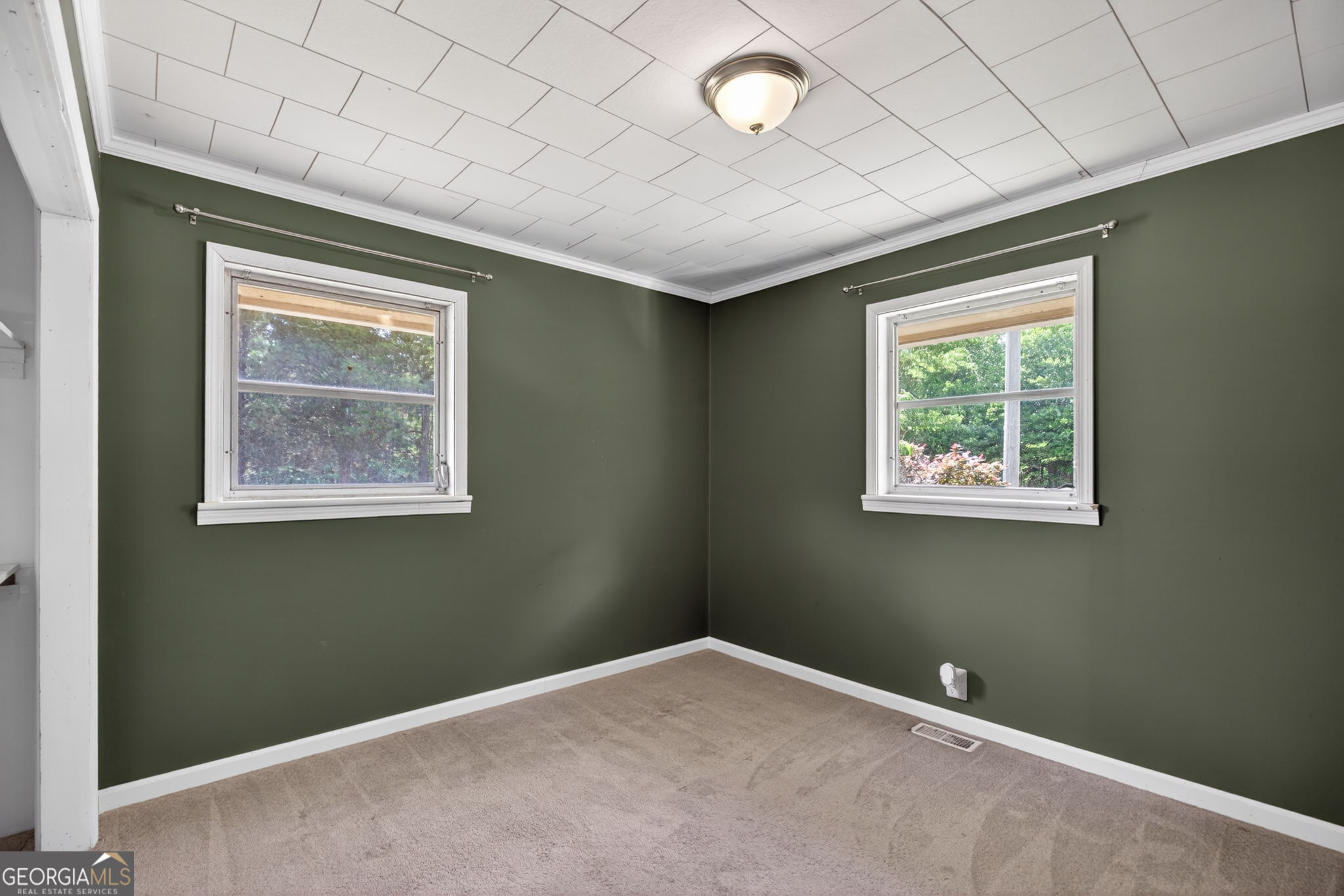 1861 Highway 100 Bowdon, GA 30108 - Photo 24 of 35 an empty room with a window