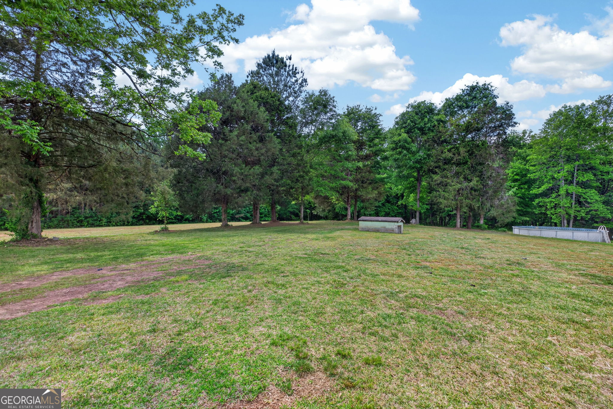 1861 Highway 100 Bowdon, GA 30108 - Photo 27 of 35 a view of outdoor space with deck and yard