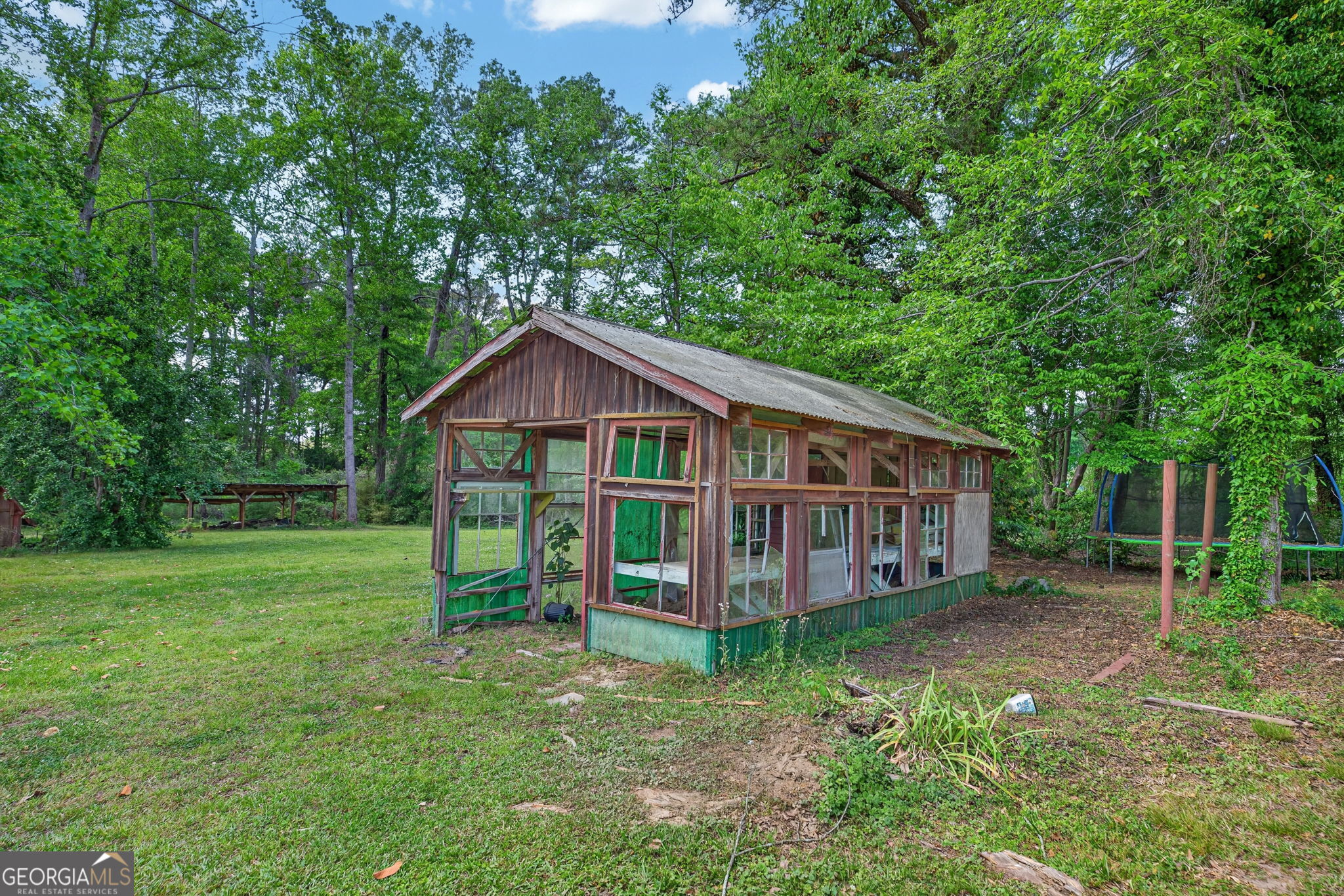 1861 Highway 100 Bowdon, GA 30108 - Photo 29 of 35 a view of a house with a yard