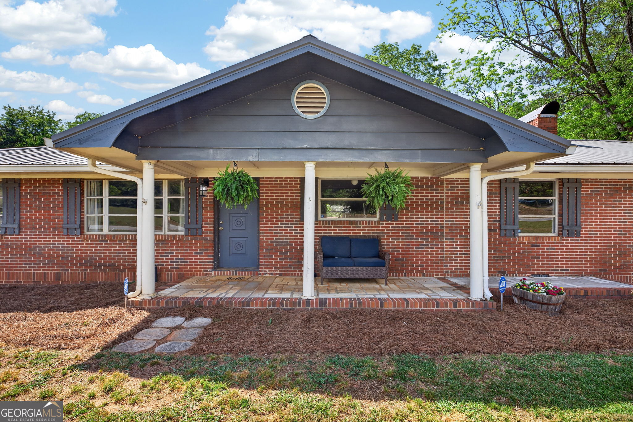 1861 Highway 100 Bowdon, GA 30108 - Photo 3 of 35 a view of a house with a yard