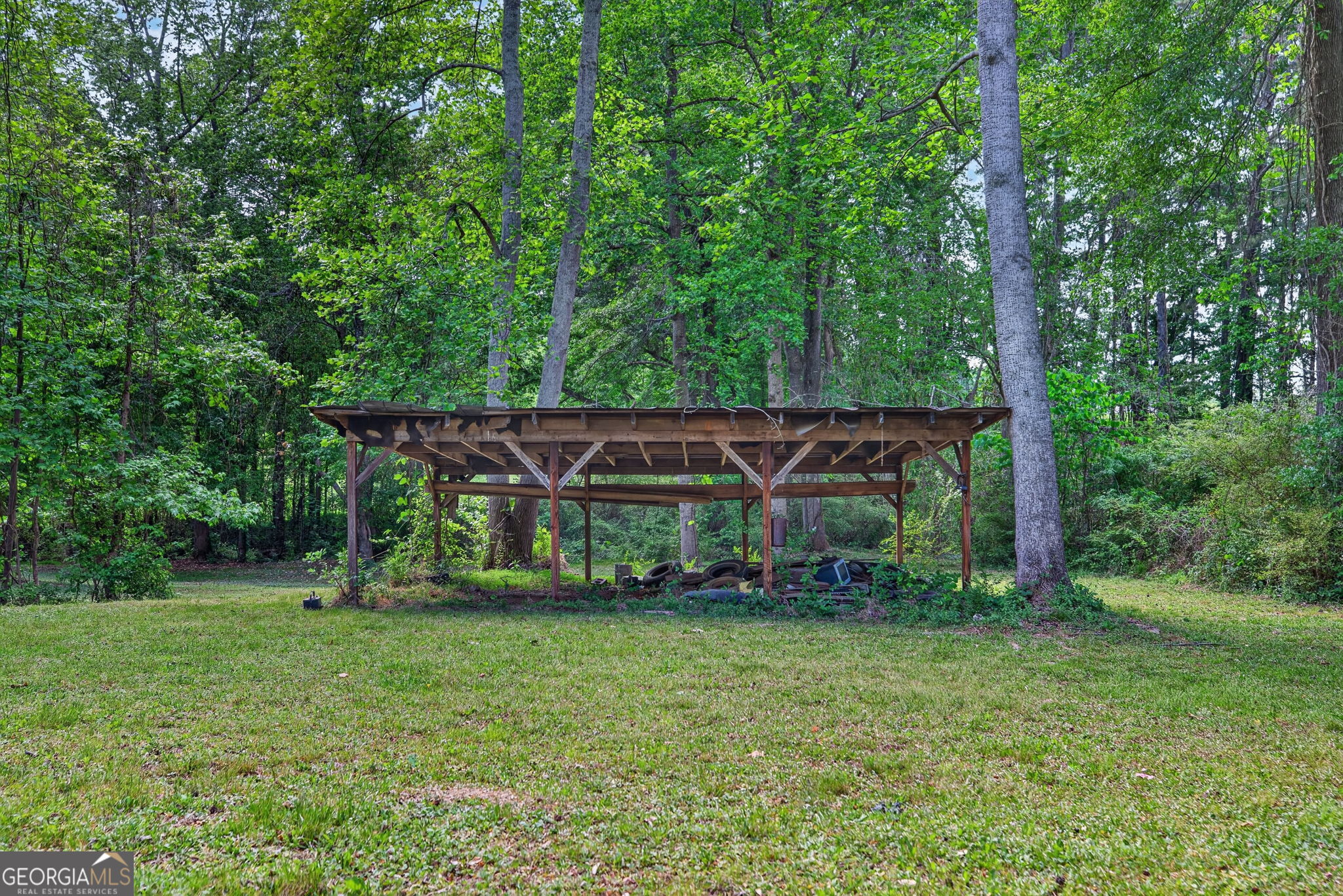 1861 Highway 100 Bowdon, GA 30108 - Photo 32 of 35 front view of a house with a yard