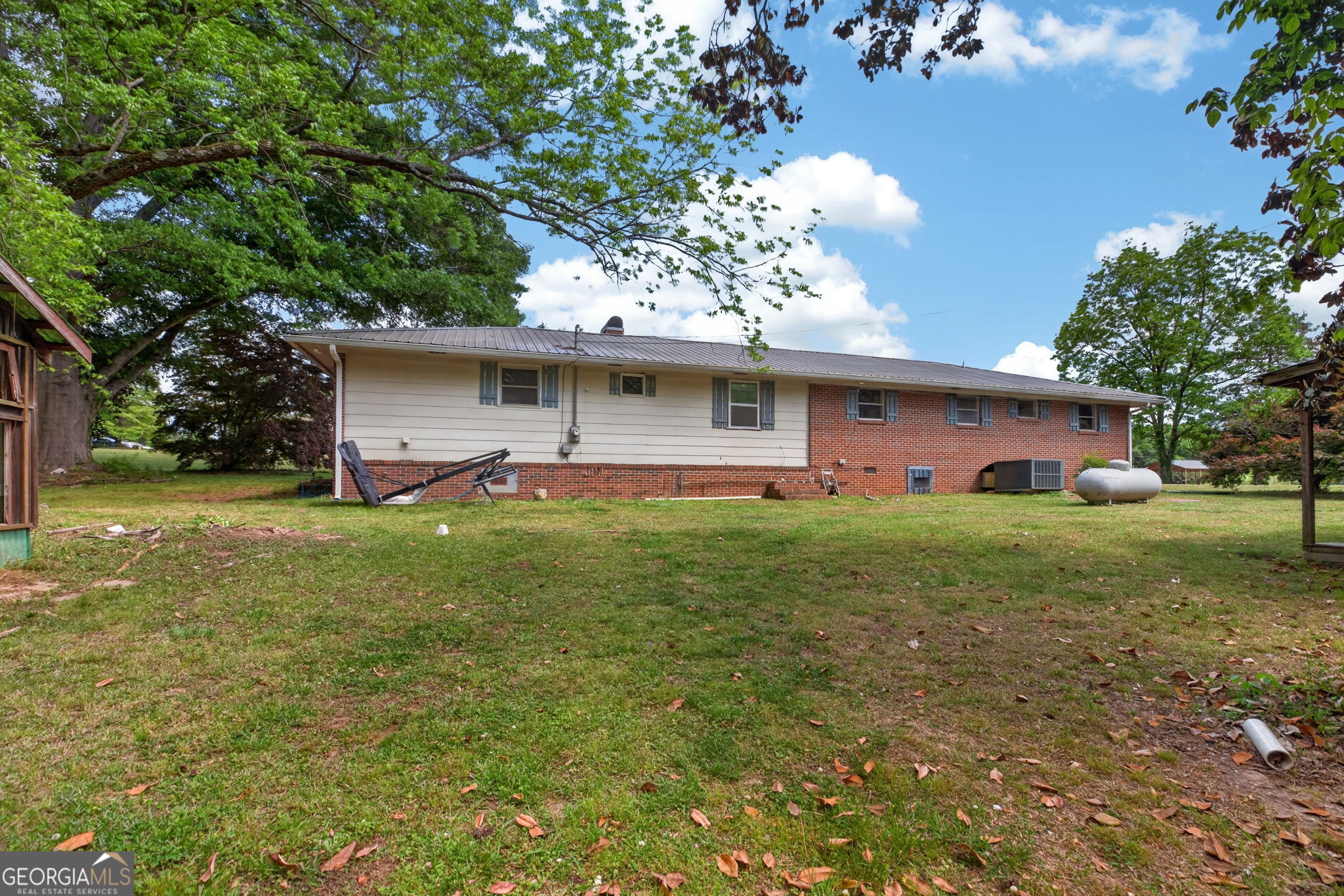 1861 Highway 100 Bowdon, GA 30108 - Photo 34 of 35 a front view of house with garden