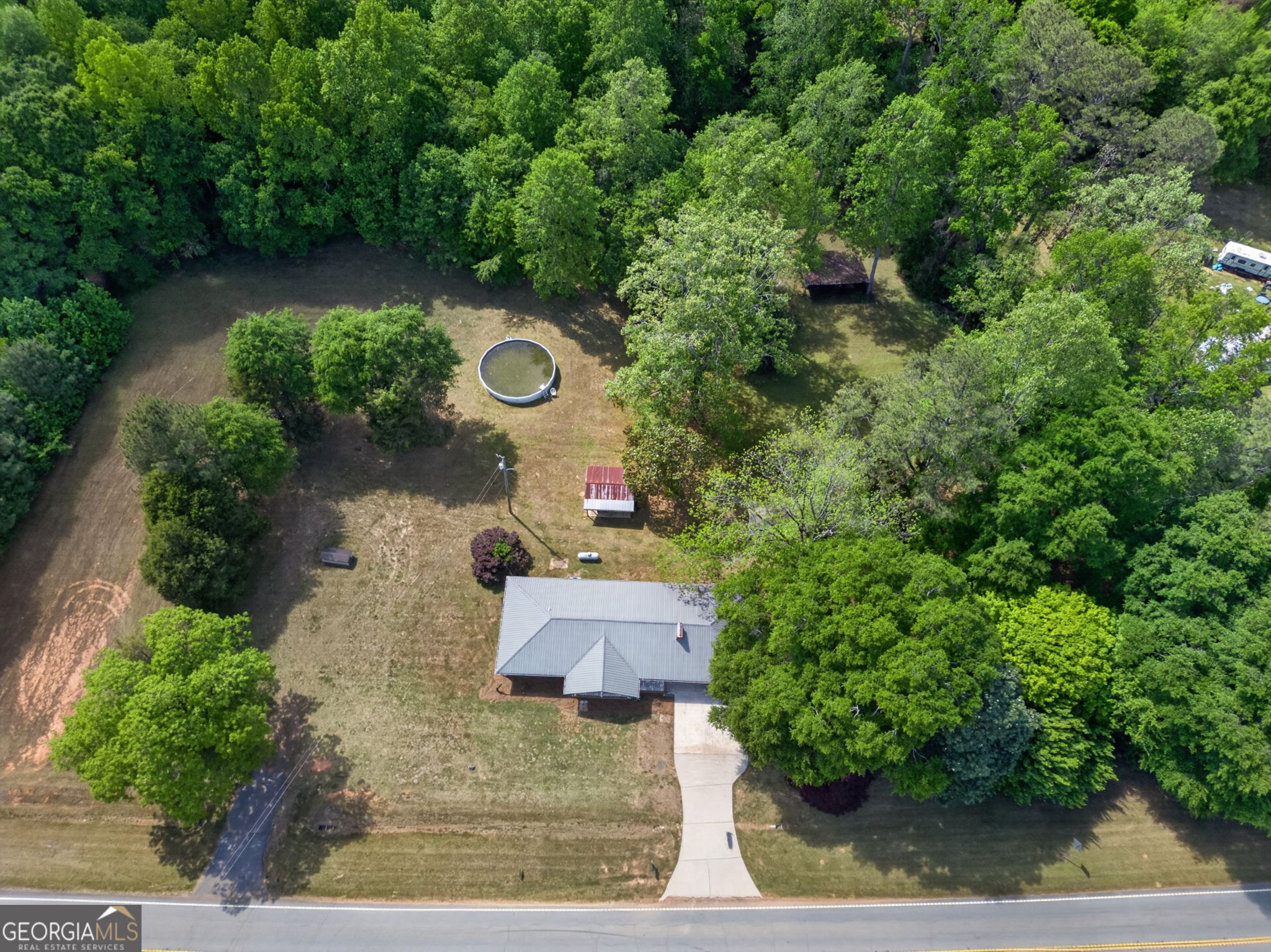 1861 Highway 100 Bowdon, GA 30108 - Photo 6 of 35 an aerial view of a house with a yard basket ball court and outdoor seating