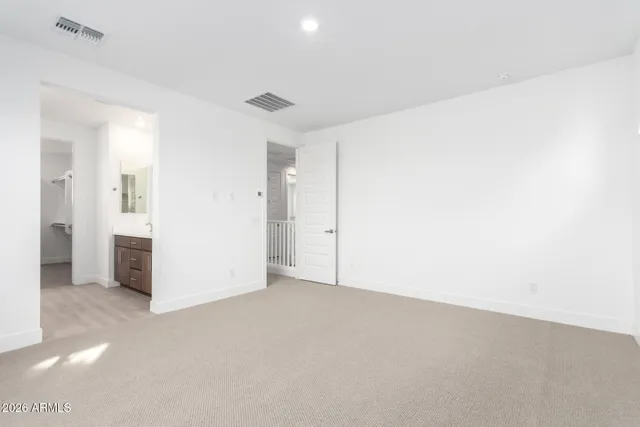 a bathroom with a sink double vanity and a mirror