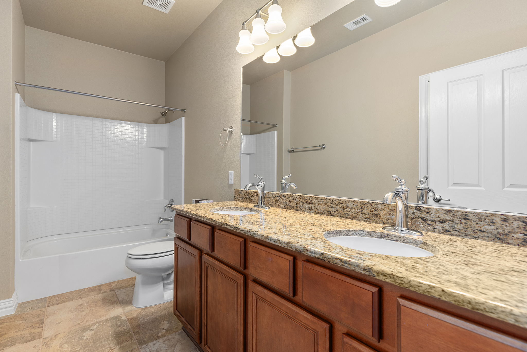 110 Emory Peak Trail Georgetown, TX 78633 - Photo 31 of 39 Full bath featuring double vanity and shower combination