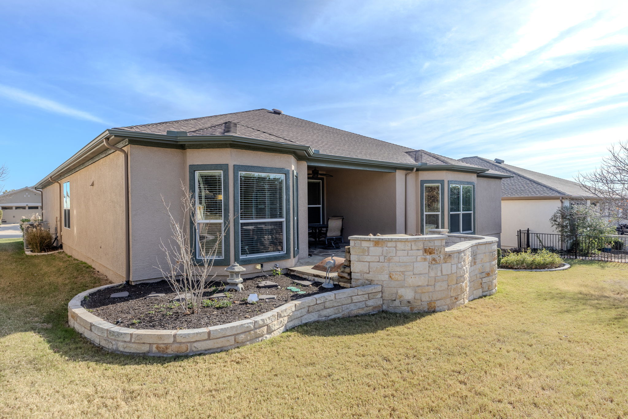110 Emory Peak Trail Georgetown, TX 78633 - Photo 35 of 39 Rear view of property featuring a patio area, stucco siding, and a ceiling fan