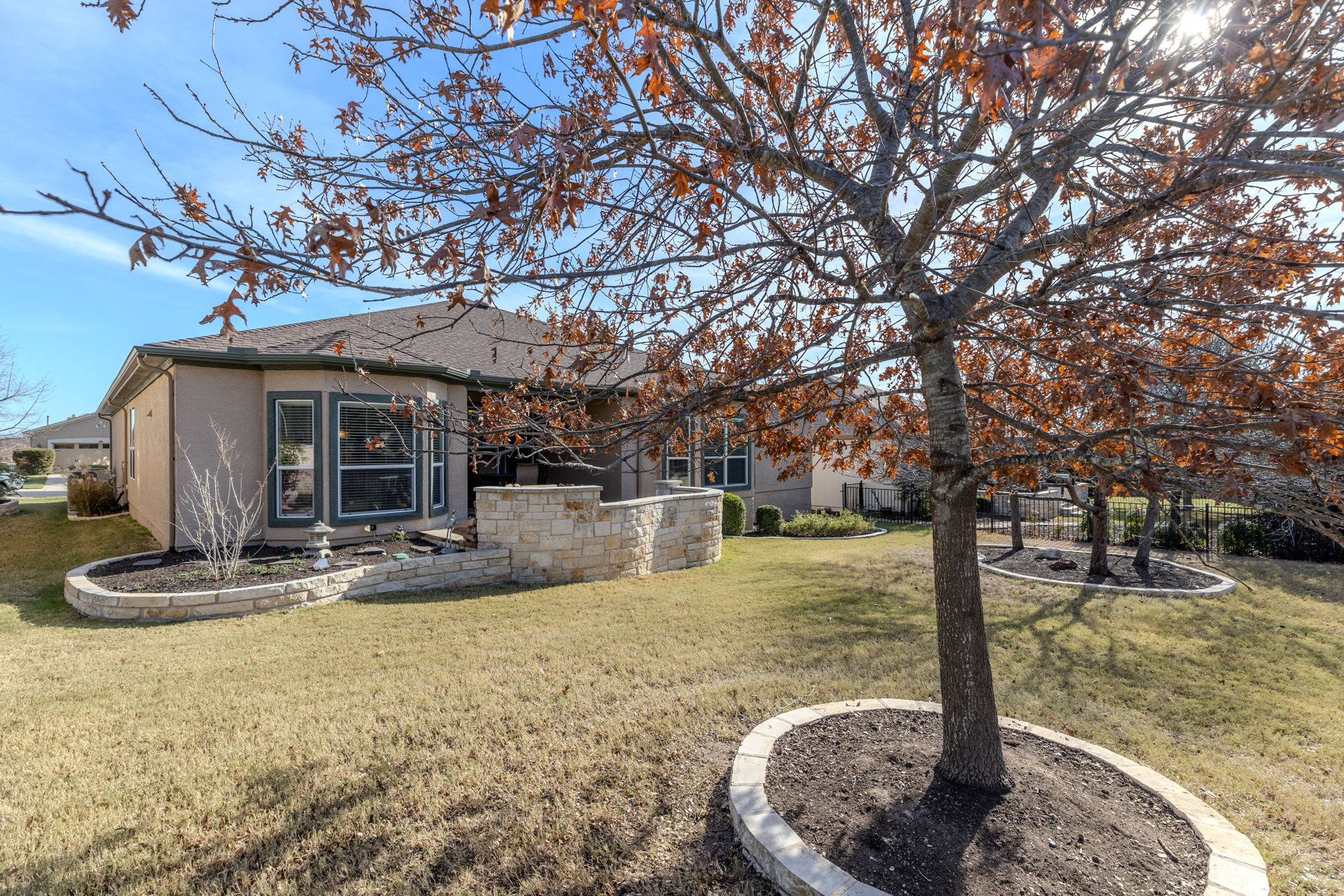 110 Emory Peak Trail Georgetown, TX 78633 - Photo 38 of 39 Rear view of house featuring stucco siding and a patio area