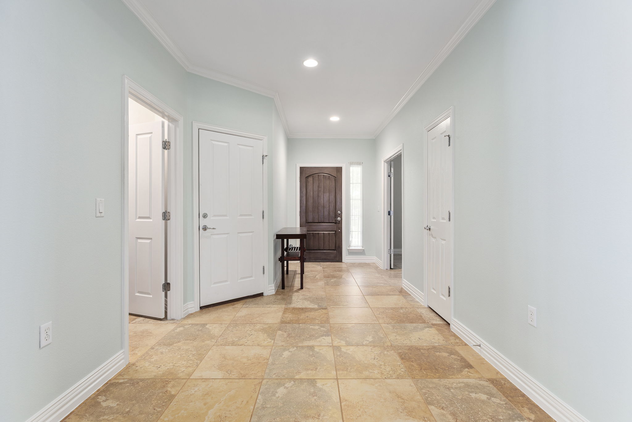 110 Emory Peak Trail Georgetown, TX 78633 - Photo 7 of 39 Hallway featuring ornamental molding and recessed lighting