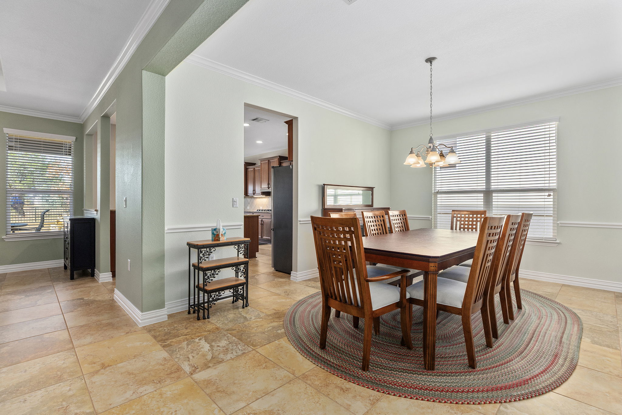 110 Emory Peak Trail Georgetown, TX 78633 - Photo 8 of 39 Dining room featuring a chandelier and crown molding