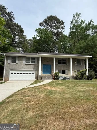 a house view with a garden space