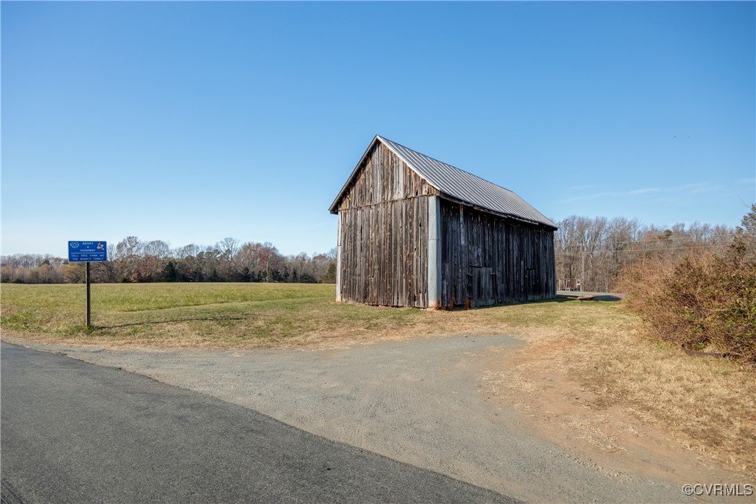 0 Three Three Chopt Road Kents Store, VA 23084 - Photo 1 of 20 a house with a yard