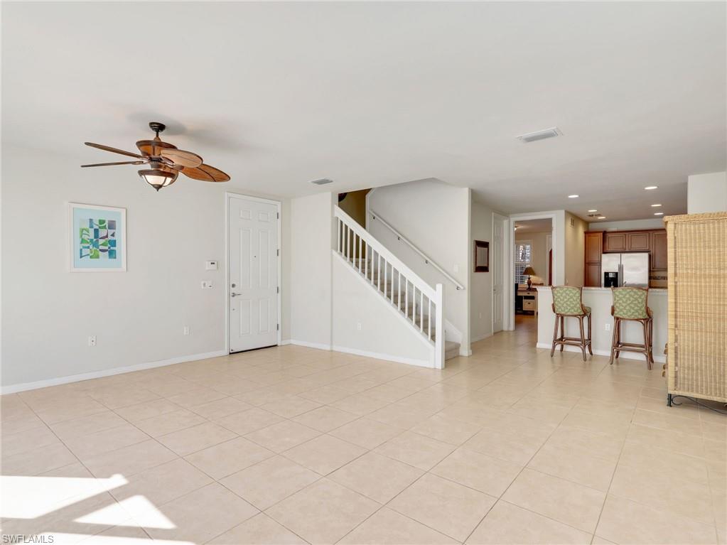 8192 Josefa Way Naples, FL 34114 - Photo 6 of 29 a view of a living room and a balcony with furniture