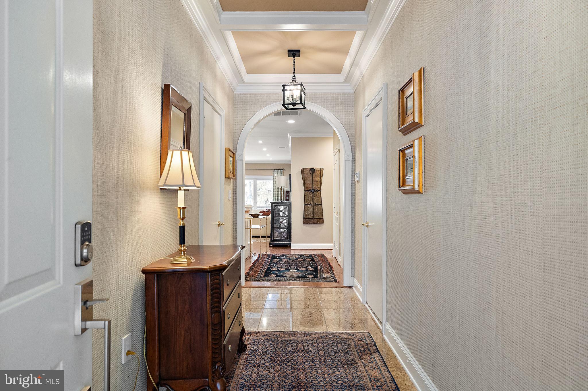 120 Bancroft Mills Road Wilmington, DE 19806 - Photo 2 of 34 a view of a hallway with a livingroom and furniture