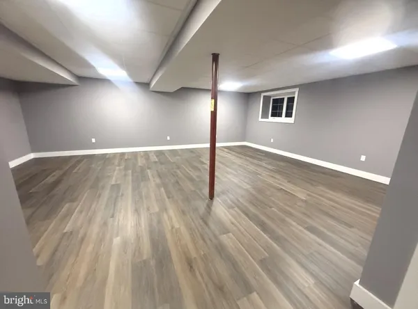 a view of a livingroom with wooden floor