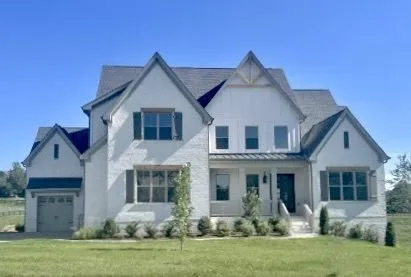 front view of house with a yard