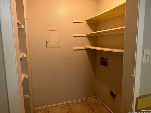 a view of an empty room and window