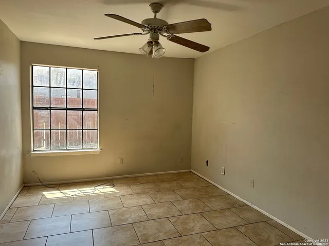 an empty room with windows