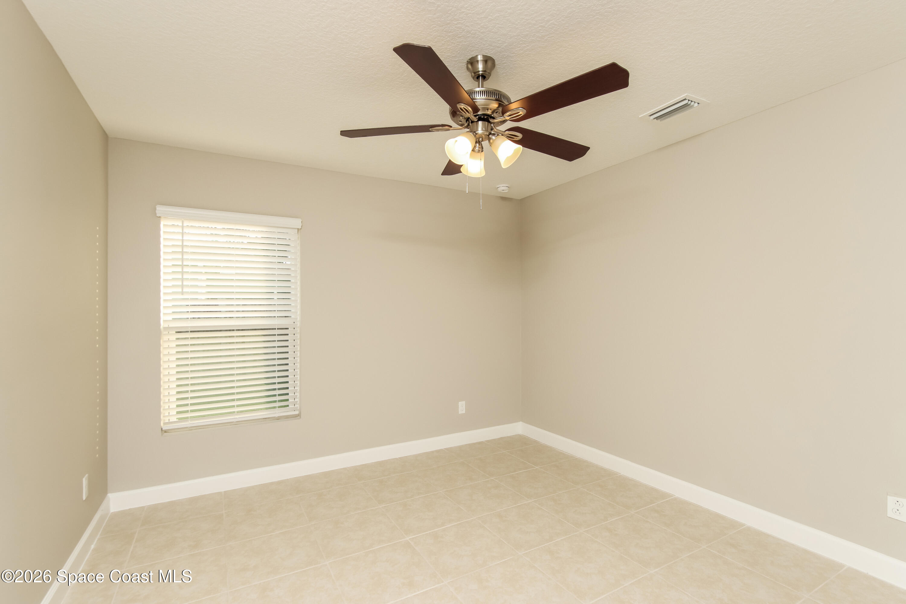 2110 Watkins Road Southeast Palm Bay, FL 32909 - Photo 10 of 15 1001399.2110 Watkins Road SE - Bedroom