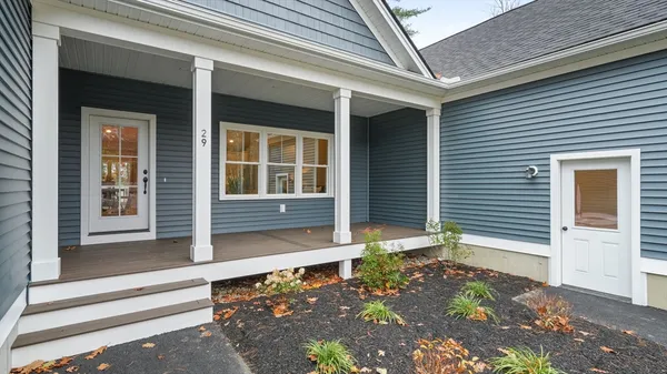 a front view of a house with a garage