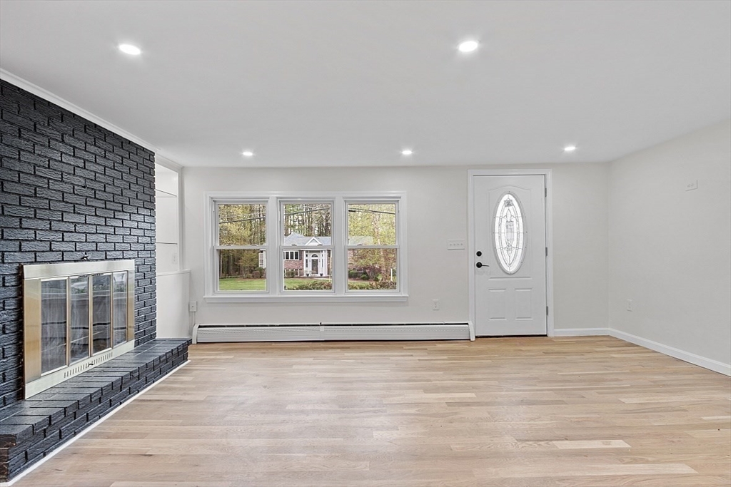 31 Pine Hill Road Chelmsford, MA 01824 - Photo 15 of 42 a view of a livingroom with wooden floor