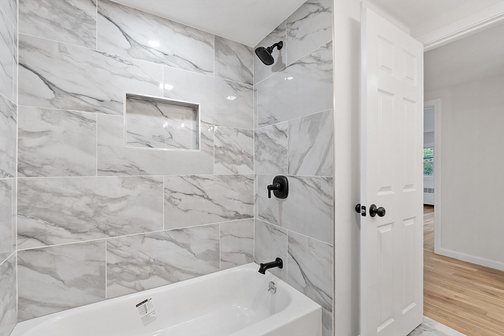 31 Pine Hill Road Chelmsford, MA 01824 - Photo 18 of 42 a bathroom with a bathtub