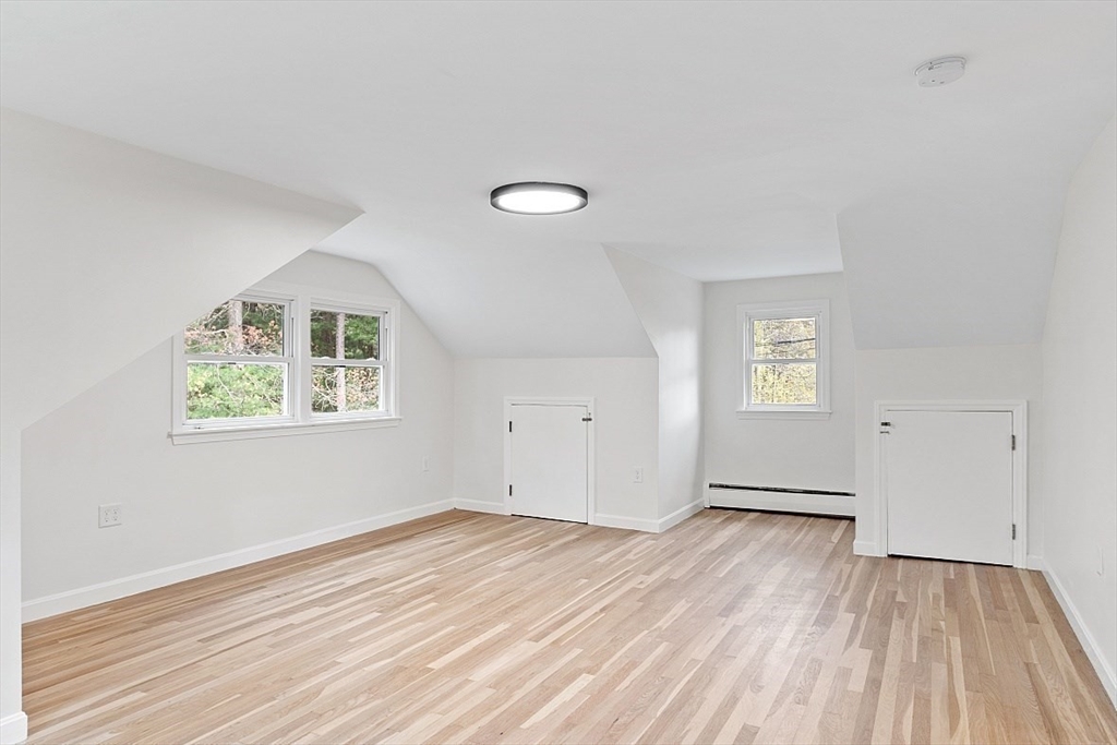 31 Pine Hill Road Chelmsford, MA 01824 - Photo 23 of 42 wooden floor in an empty room with a window