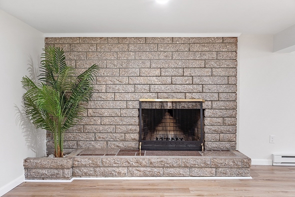 31 Pine Hill Road Chelmsford, MA 01824 - Photo 32 of 42 a closeup of a fireplace