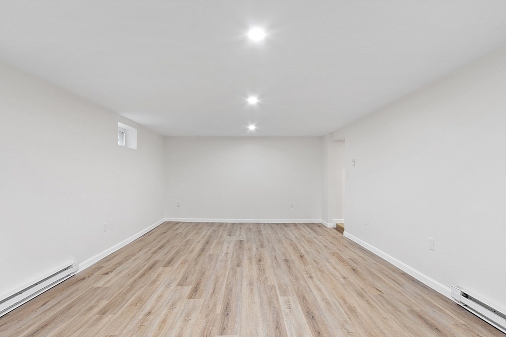 31 Pine Hill Road Chelmsford, MA 01824 - Photo 35 of 42 a view of room with wooden floor