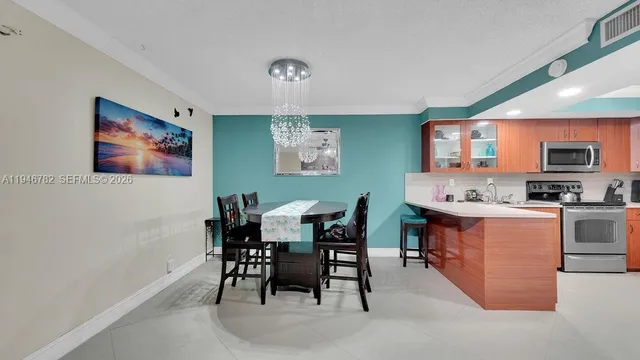 a view of a dining room with furniture