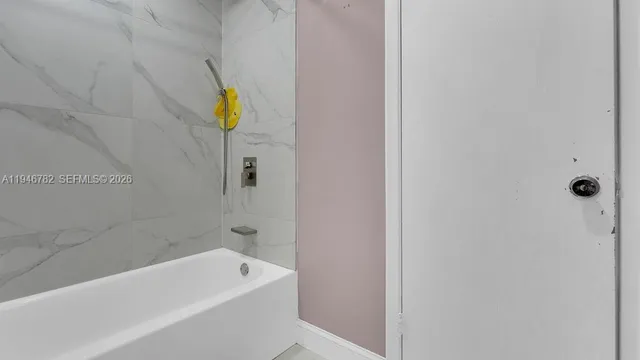 a bathroom with a sink and bathtub