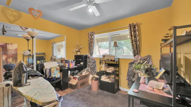 a view of a livingroom with furniture