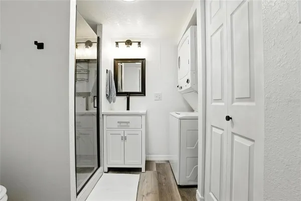 a bathroom with a sink and mirror
