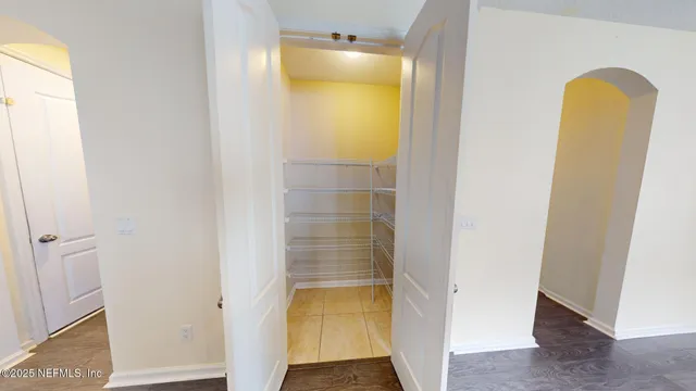 a bathroom with a tub and shower