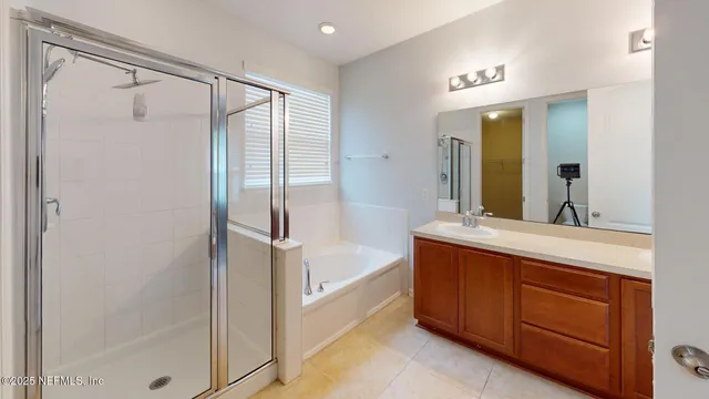 a bathroom with a bathtub and a sink