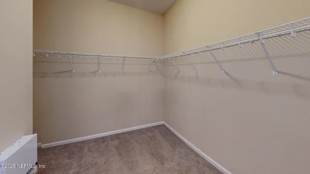 a view of a room with racks on the wall