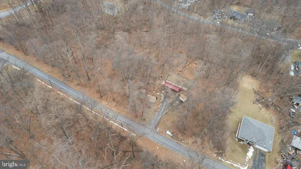 a view of a street sign of a house