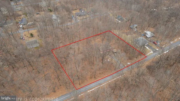a view of a livingroom with wooden floor