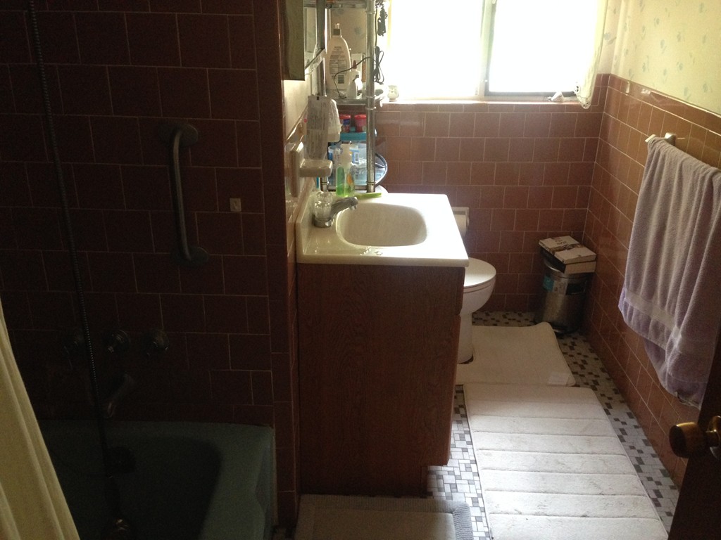 19 Clara Road Framingham, MA 01701 - Photo 12 of 13 a bathroom with a sink and toilet