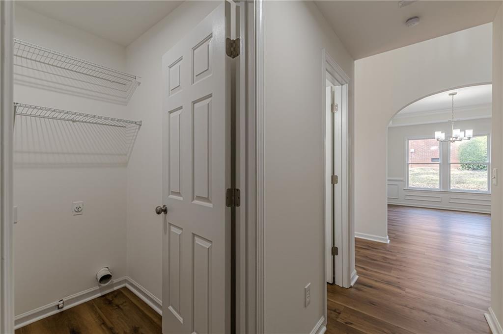 775 Southland Pass Stone Mountain, GA 30087 - Photo 11 of 76 a view of a room with wooden floor and a window